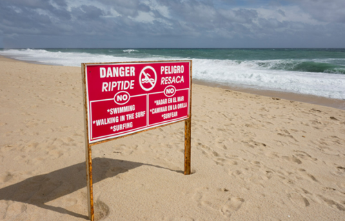 8 Things You Should Avoid When At The Beach-Beach signs: Danger Beach Riptide 